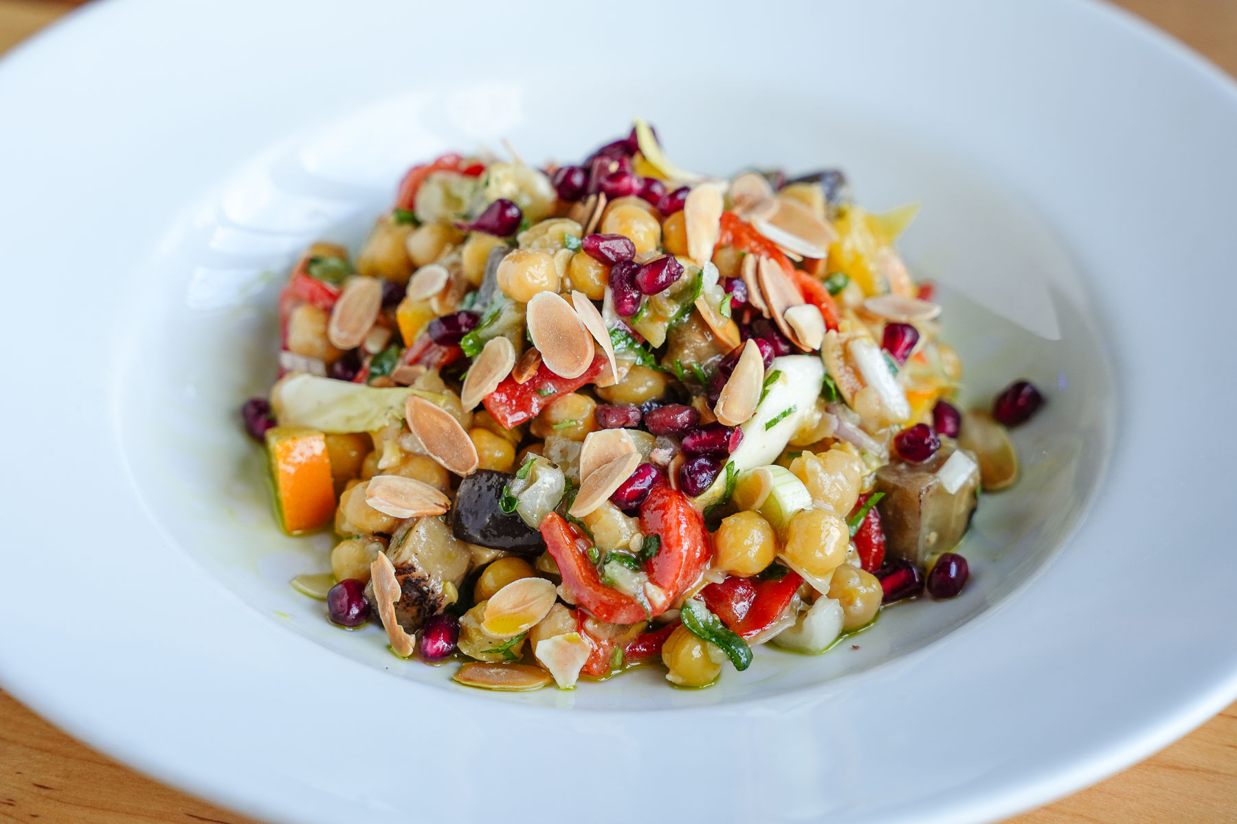 Sicilian Chickpea Salad from The Daily Catch Menu A refreshing taste of Sicily. Fire Roasted Red Peppers, Eggplant, Scallions, Toasted Almonds & Preserved Lemon.